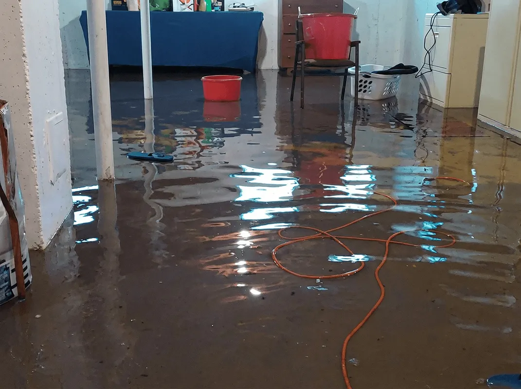 Basement with boiler, cabinets and washing machine completely flooded in Indianapolis, IN